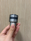 Aiko 3/8" drill chuck with key, 2-piece set, showing the metal drill chuck with attached key for secure bit tightening.
