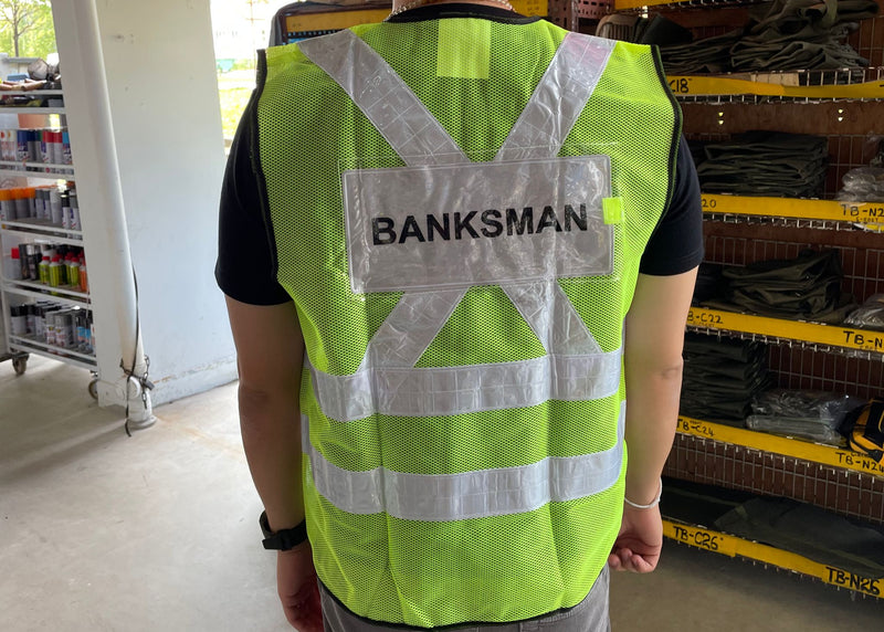 Green Safety Vest with words at back, Wording : Banksman, Fire Watchman, Lifting Supervisor, Rigger/Signal man, Security, Signal man, Traffic Controller | Model: VEST-G- Safety Vest Aiko 
